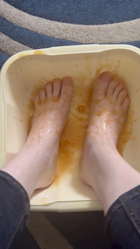 Kinky and Horny UK slut bathes feet in honey
