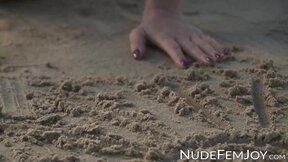 Perfect goddess like Natalie E having fun teasing herself in the white sand