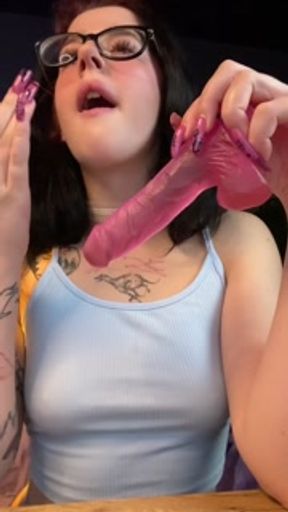 Hot babe swallows a big pink cock