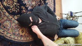 Worshiping the feet of a tattooed gothic lady