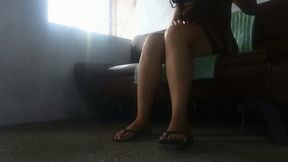 In my living room watching TV and rubbing my feet gently (7)