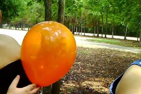 2 bbws are balloon blowing and popping