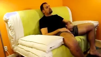 Muscular Daddy Strokes His Big Cock in Orange Room