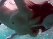 Sexy underwater redhead Nikita Vodorezova