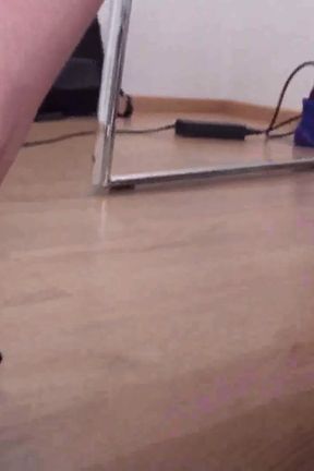 Jessica dangling feet under the table