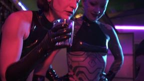 Mistress Ae dominates with strap-on in latex, Eva Elfie assists