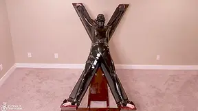 Latex Servitude Floozy Is Made To Have Multiple Orgasms On A Cross