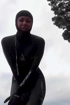 Wetsuit Giantess Finds a Tiny Toy to Tease
