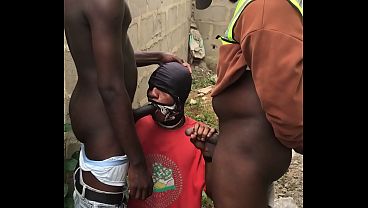 Step Dad and step son and friend giving them blowjob behind a fence wall