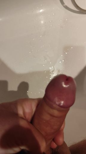 peeing with semi-stiff cock