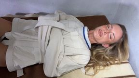 Kirby from straitjacket to shackles in prison van