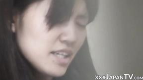 ”Nasty Japanese teenie shaves legs & fingers snatch”