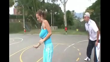 Cute Latina with big natural tits plays outdoors
