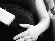 Belly inflation on a train! She inflated her belly in public and pretended to be pregnant