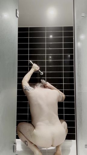 Chubby Tattooed Guy Showering