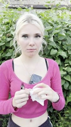 A smoker girl has a really bad cough and hocking and spitting phlegm and loogies