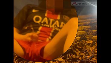 Amateur boy in football gear caught wetting himself in the street