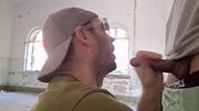 A tourist visiting an abandoned building gets his big cock sucked by a guy and cums