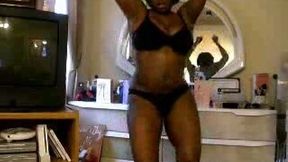Full figured ebony housewife gives me a striptease dance on webcam