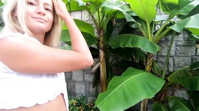 Blonde babe flashes tits on street and nudist beach