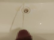 Peeing on the washbasin.