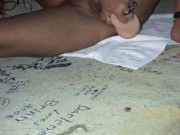 Asian fucking her toy with nipple clamps
