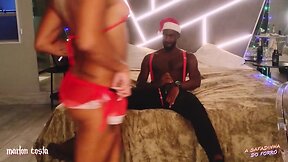 Naughty christmas: black santa brings the turkey for mrs. claus to have a wild holiday - with marlon costa