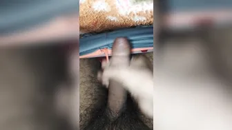Hairy bear gives slow handjob to thick six-inch cock under blanket