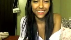 Skinny latina girl with small tits takes off her clothes on webcam