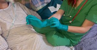 Doctor Nastya starts milking procedure with her latex surgical gloves