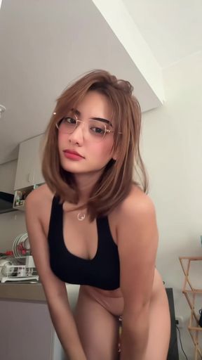 Athletic black Pinay poses with her slim thighs in a solo photoshoot