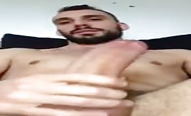 Bearded stud shooting a mega cumshot