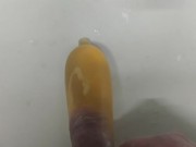 Cum and piss in a condom