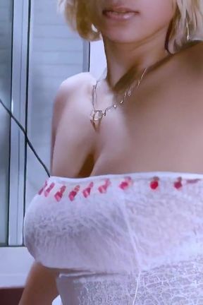 Sasha: Blonde Removing Her Clothes