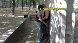 a arab twink suck a muscular boy in a public park