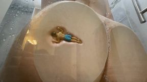 Unaware Giantess has a tiny in the shower makes him her loofah