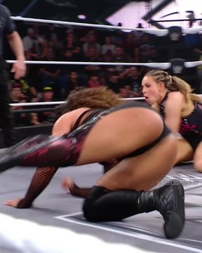Wrestling match in progress