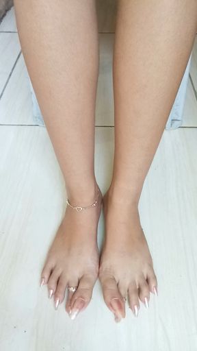 Glamorous Silver Stiletto: Seductive Long Toenails Dancing in Sexy Silver Nail Polish