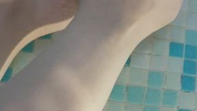 showing and playing with My feet in public pool