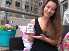 Funny brown haired girl in dark-hued top on balcony