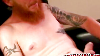 Bearded tattooed mature guy jerks off and cums on himself