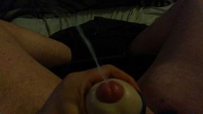Slow-Motion Closeup of Man Cumming With Open Masturbator