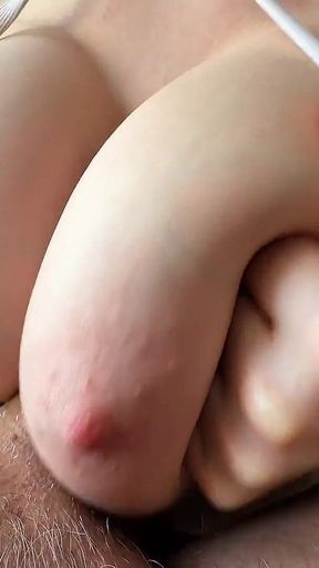 Bikini Babe with Huge Tits Performs Titfuck on Big Cock