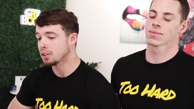 Two handsome gay chaps are having sex in their apartment