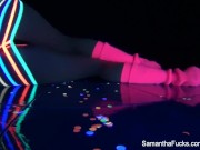 Colorful blacklight teasing with Samantha Saint