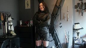 Girl Strapped Into A Fetters Leather Straitjacket