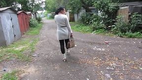 Pissing on the street in public places. Busty milf with big ass urinates on while walking outdoors. Amateur fetish.