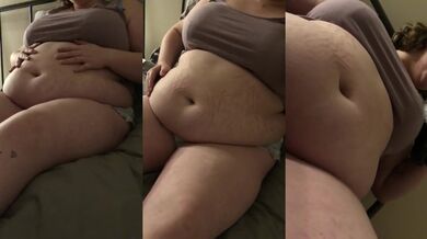 Her bloated belly jerks as she gags on her own chubby tummy
