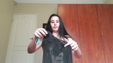 Girl trying on different lingerie and micro panties