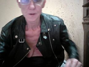 SMOKING TITS IN LEATHER